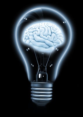 Brain inside a light bulb made in 3d over a black background
